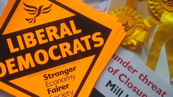 Liberal Democrat posters on table